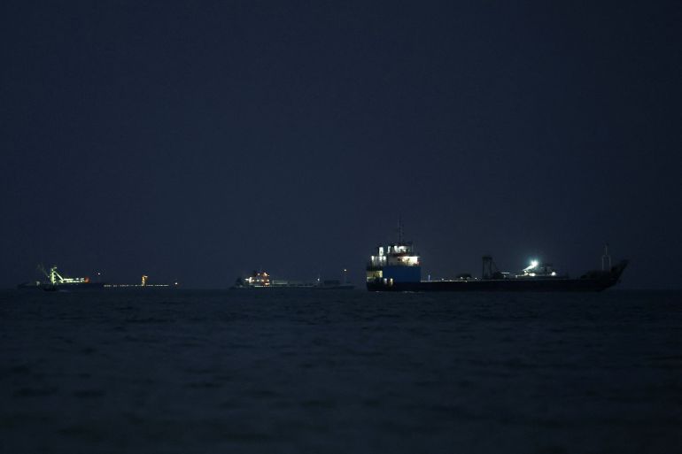Vessels in the Strait of Hormuz are visible near the beach of Bandar Abbas, Iran, May 22, 2026. Majid Asgaripour/WANA (West Asia News Agency) via REUTERS ATTENTION EDITORS - THIS PICTURE WAS PROVIDED BY A THIRD PARTY